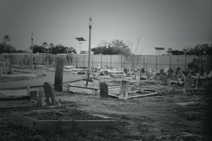 A black and white view of Metairie Cemetery graves.